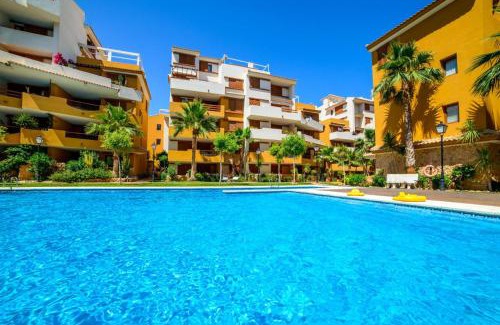 Punta Prima Apartment | Discover Roza Punta Prima: Family-Friendly with Pool Access