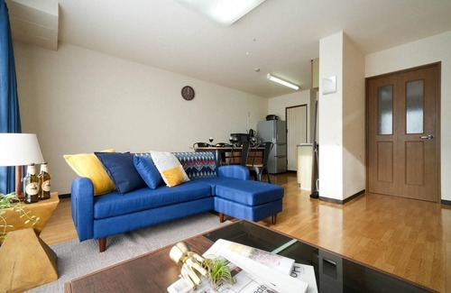 Shinhidaka Apartment | Experience Riverside Mansion with Breakfast & Parking Included