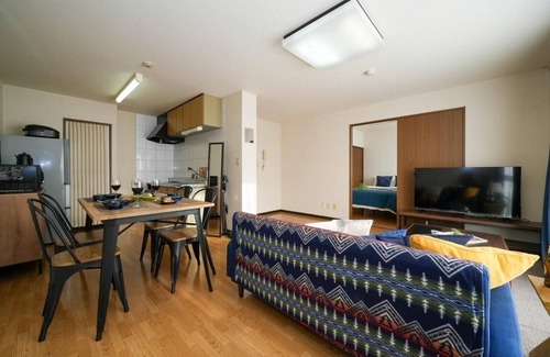Shinhidaka Apartment | Experience Riverside Mansion with Breakfast & Parking Included