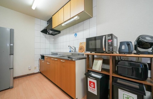 Shinhidaka Apartment | Explore Riverside Mansion Room 206 with Breakfast & Parking