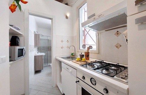 Rione VII Regola Apartment | Pet-Friendly Getaway: Field of Flowers Apartment Awaits