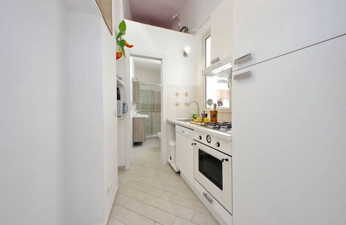 Rione VII Regola Apartment | Pet-Friendly Getaway: Field of Flowers Apartment Awaits