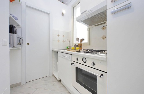 Rione VII Regola Apartment | Pet-Friendly Getaway: Field of Flowers Apartment Awaits