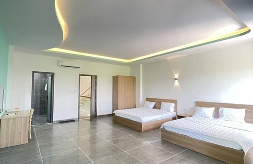Ba Ria Hotel | Cozy Ruby Motel Ba Ria: Family-Friendly with Kitchen Access