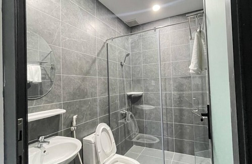 Ba Ria Hotel | Cozy Ruby Motel Ba Ria: Family-Friendly with Kitchen Access