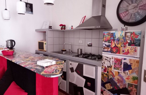 Ostiense House | Discover Comfort at RUBY RED with Kitchen & Breakfast