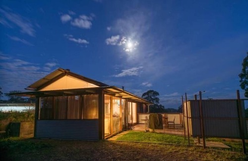 Minimbah Cottage | Rudders River View Cottage: Pet-Friendly Oceanfront Oasis