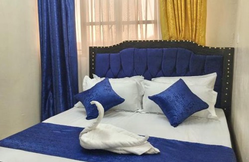 Busia Apartment | Family-Friendly Rue's Apartment for Memorable Stays