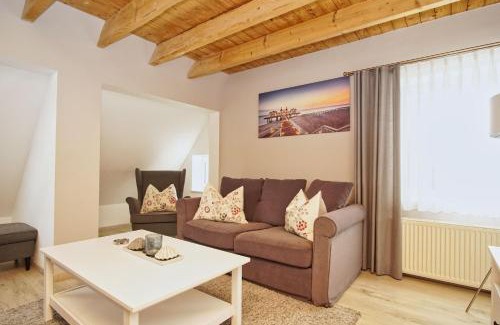 Bergen auf Ruegen Apartment | Idyllic Retreat by the Beach with Pool Access at Gutshaus Silvitz