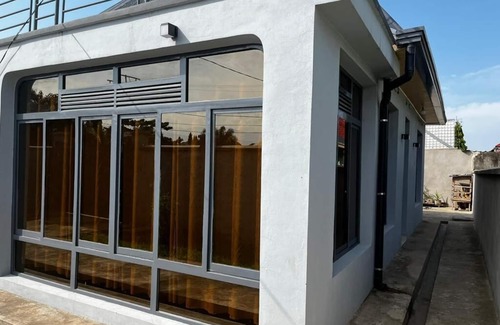Bujumbura House | Discover Relaxation at Ruhuka House with Spa & Pool Access