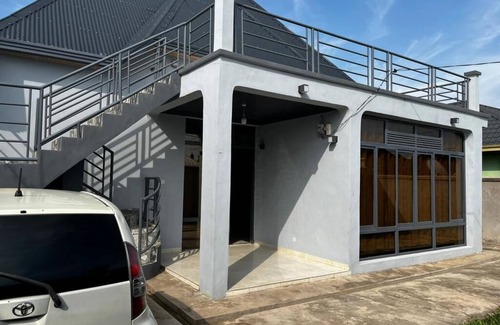 Bujumbura House | Discover Relaxation at Ruhuka House with Spa & Pool Access