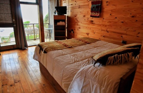 Cobquecura Cabin | Discover Ruka Antu Ecolodge: Oceanfront Retreat with Pool