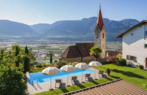 Termeno Sulla Strada del Vino Apartment | Oceanfront Runggnerhof: A 4-Star Family Retreat