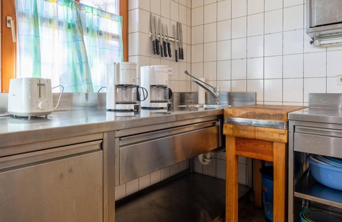Scheffau am Wilden Kaiser House | Rustic Tyrolean Guesthouse Near Ski Lift with Breakfast & Pets