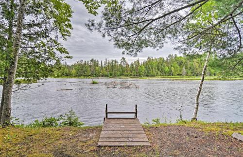Tower House | Inviting Modern Retreat with Fire Pit on Tower Pond