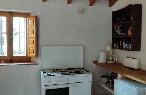 Cajiz House | Cozy Cajiz Apartment with Ocean Views and Spa Amenities