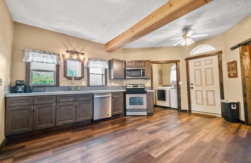 Windyville Cabin | Idyllic Getaway: Rustic Beauty by the Niangua River
