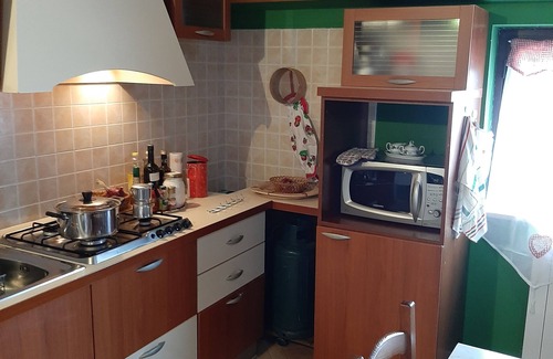 San Vincenzo La Costa Apartment | Charming Rustic Country House with Pool & Family Amenities