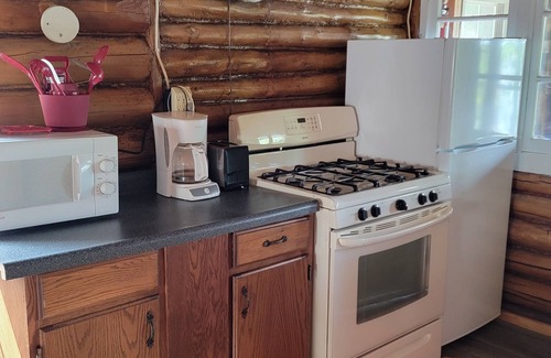 Phillips Cabin | Idyllic Cabin Retreat on Soo Lake with Spa and Hot Tub