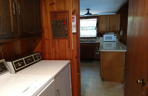 Cheboygan Cabin | Inviting Cedar Log Cabin with Pool and Lake Views