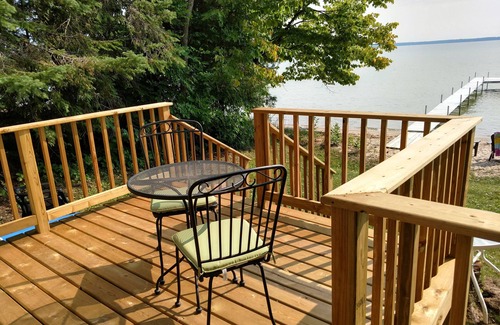 Cheboygan Cabin | Inviting Cedar Log Cabin with Pool and Lake Views