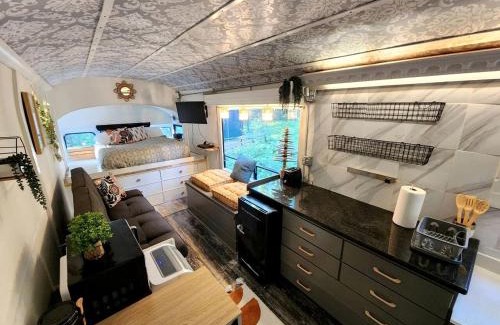 Bitely House | Rustic Converted School Bus with Outdoor Shower Near ORV Trails in Manistee National Forest, Michigan