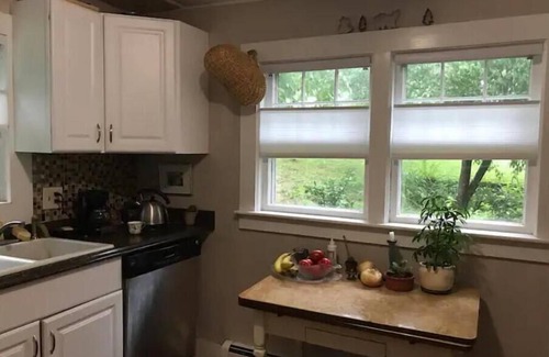 New London Cottage | Cozy Cottage Retreat with Spa and Hot Tub by the Brook
