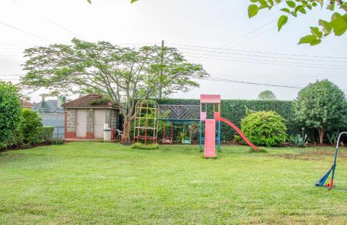 Nairobi House | Inviting Rustic Cottage with Garden and Pet-Friendly Amenities