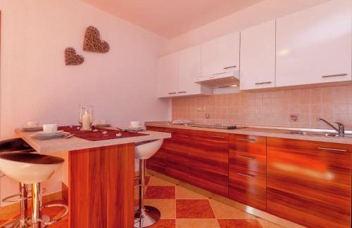 Dramalj Apartment | Inviting Oceanfront Apartment in Dramalj with Pool