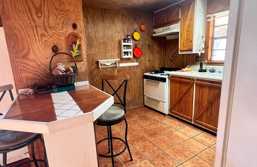Noble Cottage | Cozy Forest Retreat with Workspace & Pet-Friendly Amenities