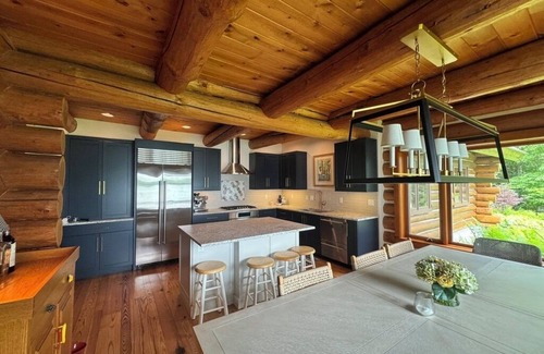 Walloon Lake Cabin | Inviting Walloon Lake Waterfront Log Home with Pool & Spa