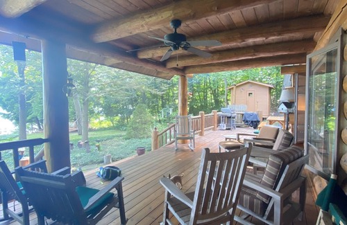Walloon Lake Cabin | Inviting Walloon Lake Waterfront Log Home with Pool & Spa