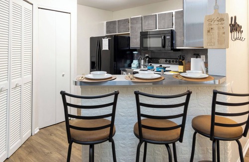 Gainesville Apartment | Urban Retreat: Embrace Comfort with Pool and Spa Access