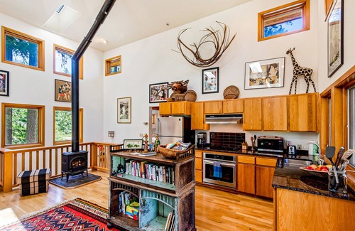 Harrison House | Charming Forest Retreat Overlooking Lake Coeur d’Alene
