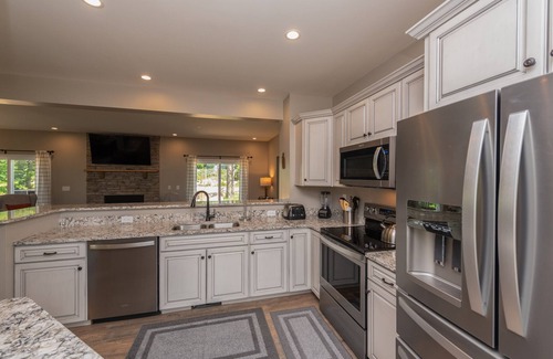 McHenry House | Cozy Lake Retreat with Hot Tub, Pool & Spa Amenities