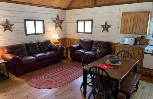 Uvalde Cabin | Cozy River Cabin Steps from the Water with Pet-Friendly Perks