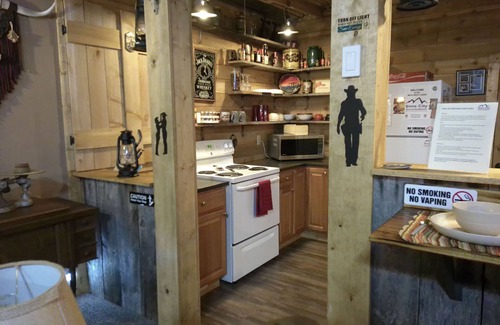 Harrison Cabin | Discover Rustic Serenity at Sims City in the Ozarks