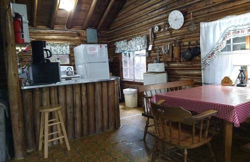 Dennysville Cottage | Cozy River-View Log Cottage - Pet-Friendly Retreat in Maine