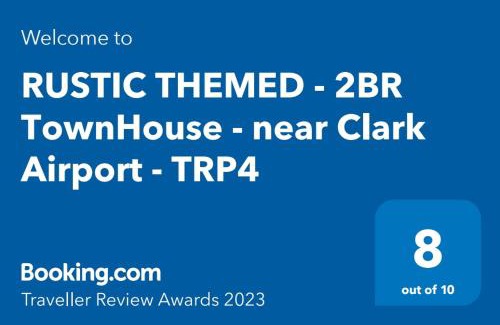 Clark Apartment | Rustic 2BR Townhouse near Clark Airport - Pet Friendly Stay