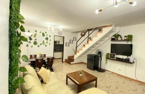 Clark Apartment | Rustic 2BR Townhouse near Clark Airport - Pet Friendly Stay