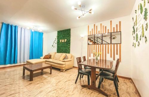 Clark Apartment | Rustic 2BR Townhouse near Clark Airport - Pet Friendly Stay