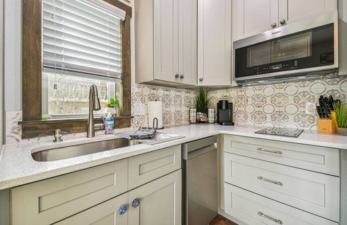 Dunedin House | Exquisite Tiny Home on Pinellas Trail with Heated Pool