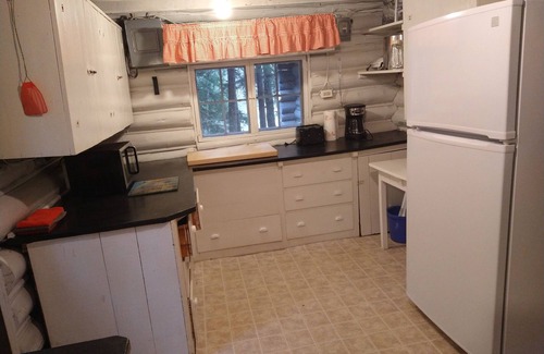 Dennysville Cottage | Rustic Log Cottage with River Views & Pet-Friendly Amenities