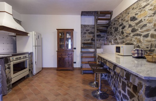 Licciana Nardi Villa | Scenic Farmhouse Retreat with Pool and Garden Oasis