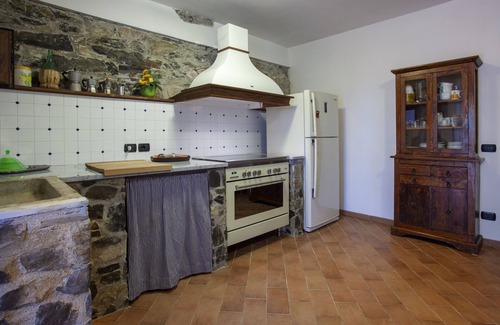 Licciana Nardi Villa | Scenic Farmhouse Retreat with Pool and Garden Oasis