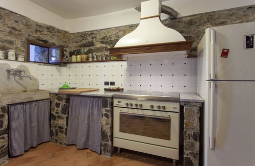 Licciana Nardi Villa | Scenic Farmhouse Retreat with Pool and Garden Oasis