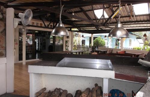Prasat Resort | Ryans Resort: Oceanfront Retreat with Spa & Family Amenities