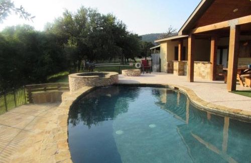 Concan House | Discover Ryder's Ridge: Family-Friendly with Pool & Hot Tub
