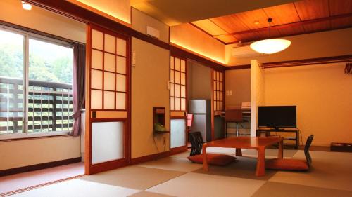 Yufu Hotel | Experience Relaxation at Ryokan Maruya with Hot Tub Amenities