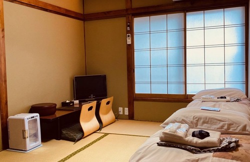 Higashigotanda House | Guest Rated: 9.8 at Ryokan Sansuiso with Family-Friendly Perks